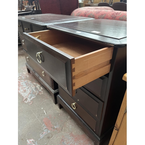 79A - A Stag Minstrel mahogany bedside chest of four drawers