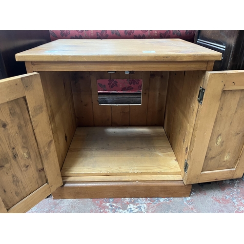 80 - A pine two door stereo cabinet