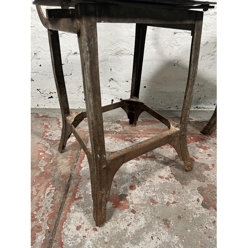 85A - A pair of 1950s Tan-Sad style fibreboard and cast metal industrial factory chairs