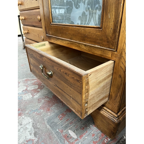 88 - A Willis & Gambier solid oak stereo cabinet