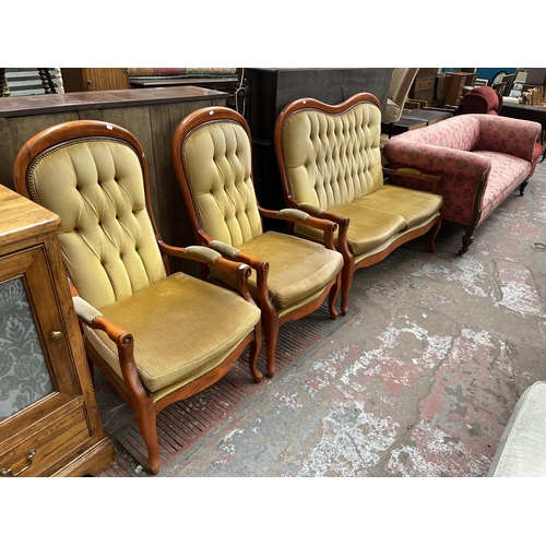 89 - A French style beech and yellow fabric upholstered three piece lounge suite comprising two seater so... 