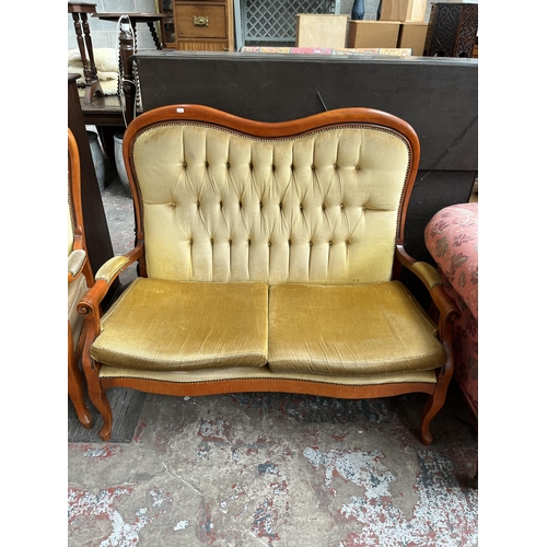 89 - A French style beech and yellow fabric upholstered three piece lounge suite comprising two seater so... 