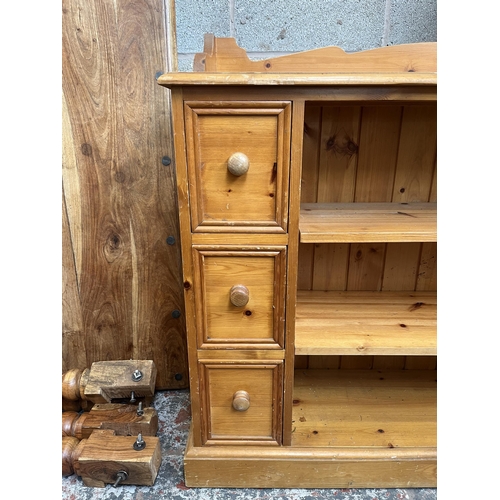 9 - A solid pine sideboard with six drawers and two shelves - approx. 92cm high x 121cm wide x 30cm deep