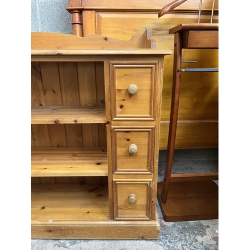 9 - A solid pine sideboard with six drawers and two shelves - approx. 92cm high x 121cm wide x 30cm deep