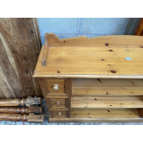 9 - A solid pine sideboard with six drawers and two shelves - approx. 92cm high x 121cm wide x 30cm deep