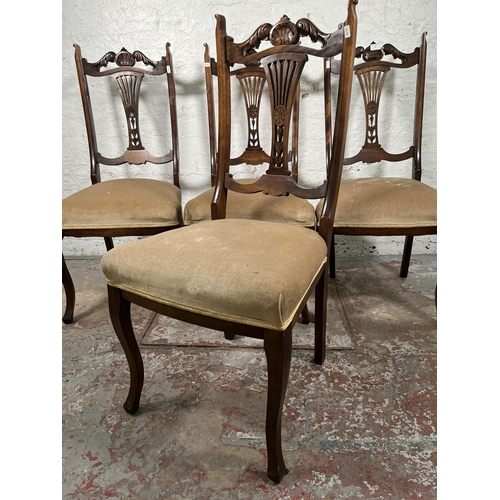 92 - A set of four Edwardian beech and fabric upholstered dining chairs