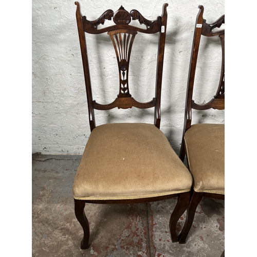 92 - A set of four Edwardian beech and fabric upholstered dining chairs