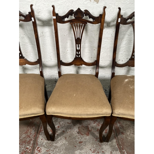 92 - A set of four Edwardian beech and fabric upholstered dining chairs