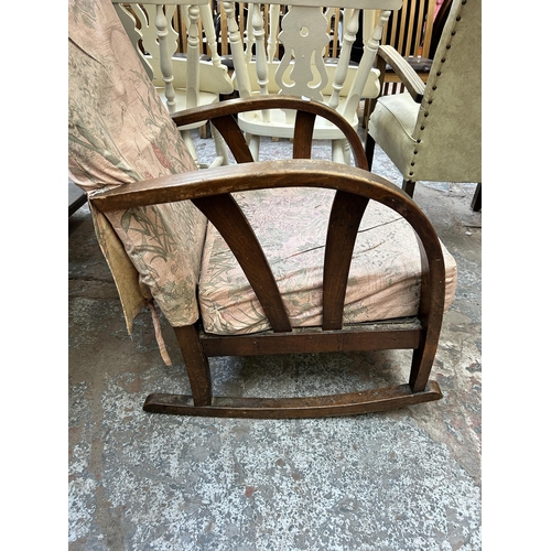 101 - A 1930s bentwood and fabric upholstered rocking armchair