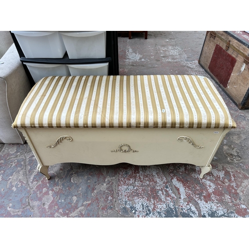 112 - A Louis XVI style white painted and fabric upholstered blanket box