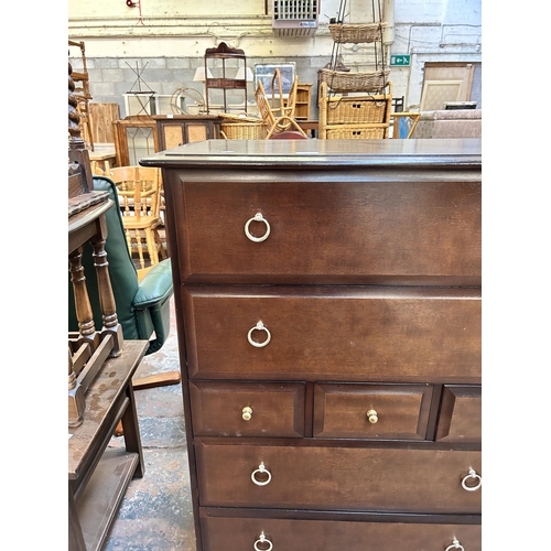 124 - A Stag Minstrel mahogany chest of three short and four long drawers