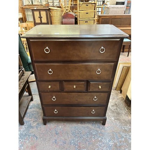 124 - A Stag Minstrel mahogany chest of three short and four long drawers