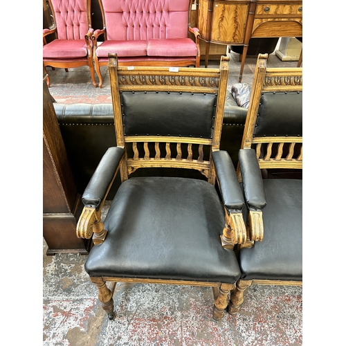 133 - A set of eight Sopwith & Co Newcastle on Tyne carved oak and black leatherette dining chairs with ca... 