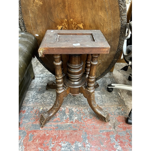 140 - A Victorian inlaid walnut oval loo table on quatrefoil base