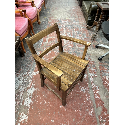 146 - An early 20th century beech garden armchair