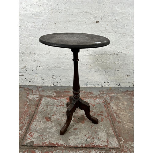 152 - A 19th century carved mahogany tripod pedestal side table with circular oak top