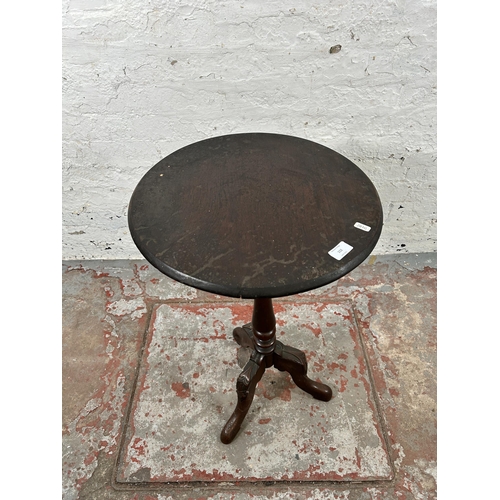 152 - A 19th century carved mahogany tripod pedestal side table with circular oak top