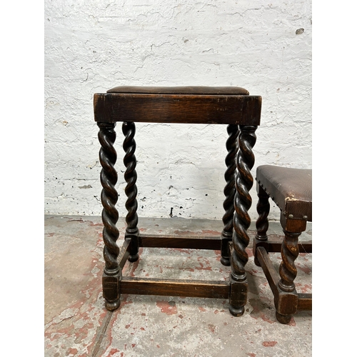 159 - Two early/mid 20th century oak and brown leatherette stools on barley twist supports