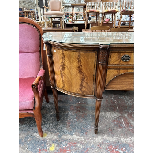 160 - A Regency style mahogany bow fronted sideboard with two cupboard doors and two drawers