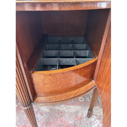 160 - A Regency style mahogany bow fronted sideboard with two cupboard doors and two drawers