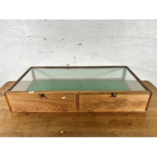 162 - An Edwardian oak and glass two door table top display case - approx. 20cm high x 17cm wide x 58cm de... 