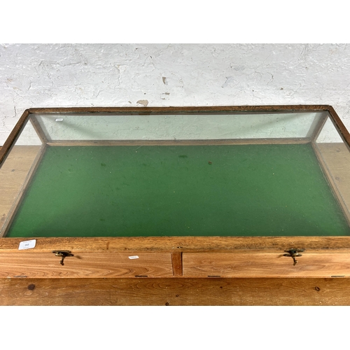 162 - An Edwardian oak and glass two door table top display case - approx. 20cm high x 17cm wide x 58cm de... 