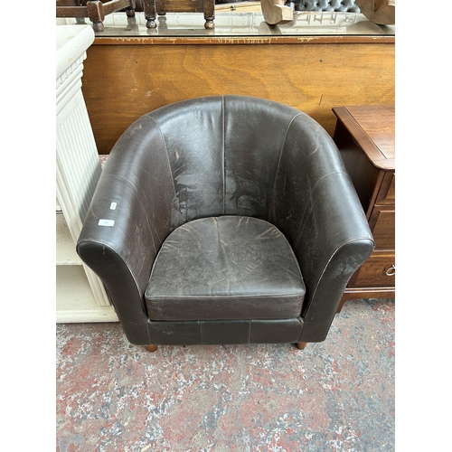 172 - A brown leather tub chair