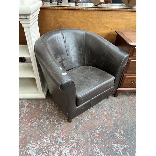 172 - A brown leather tub chair