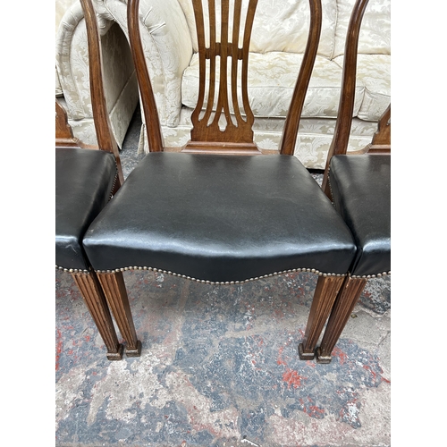 204 - Four Victorian mahogany and black vinyl dining chairs