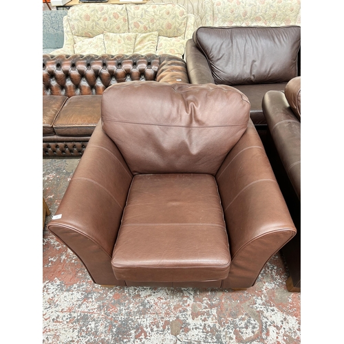 208 - A Marks & Spencer brown leather armchair