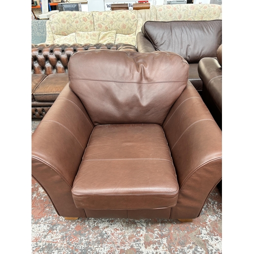 208 - A Marks & Spencer brown leather armchair