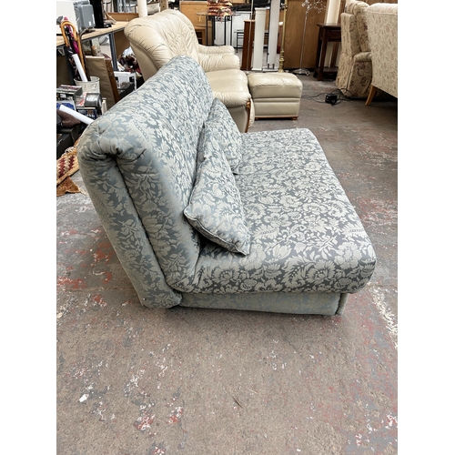 212C - A floral upholstered sofa bed