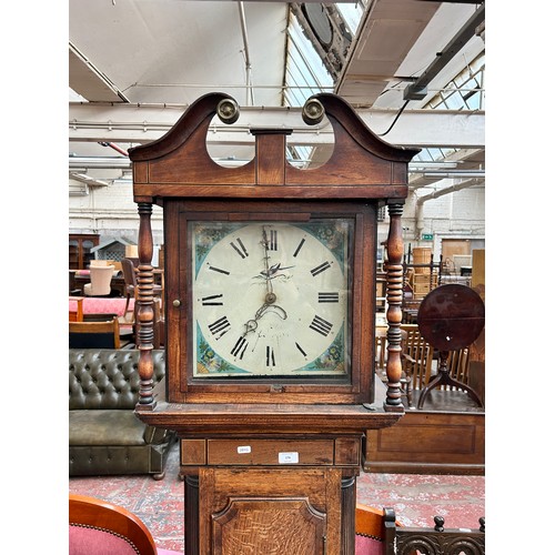 176 - A Georgian oak cased grandfather clock with hand painted enamel face, pendulum and weight