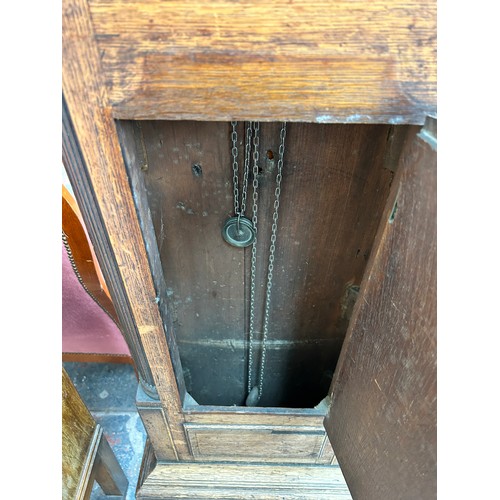 176 - A Georgian oak cased grandfather clock with hand painted enamel face, pendulum and weight