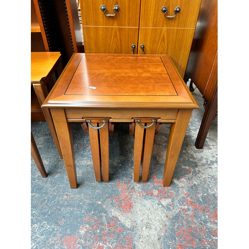 182 - Six pieces of furniture to include teak nest of two tables, beech farmhouse type stool, cherry wood ... 