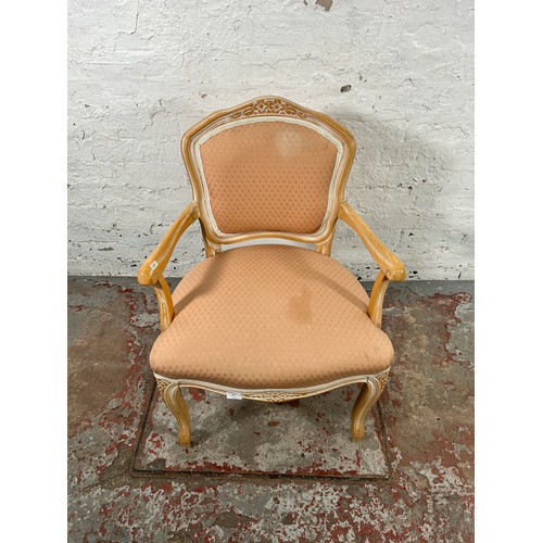 183 - A Louis XVI style beech and pink fabric upholstered armchair