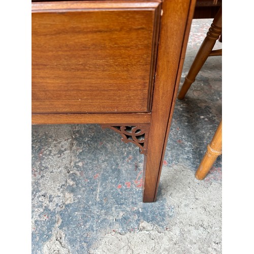 184 - An Edwardian mahogany chest of two short over two long drawers