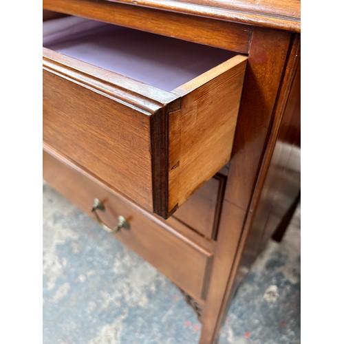 184 - An Edwardian mahogany chest of two short over two long drawers