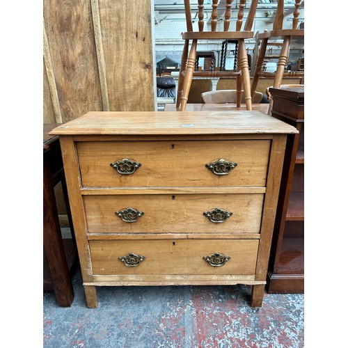 192 - A Victorian pine chest of three drawers