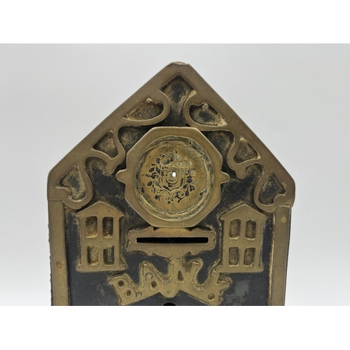 2272 - A Victorian brass and iron novelty bank money box - approx. 19cm high