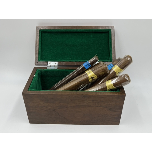 2276 - Six sealed cigars, four JR hand made imported and two Racine & Laramie together with oak box with ba... 