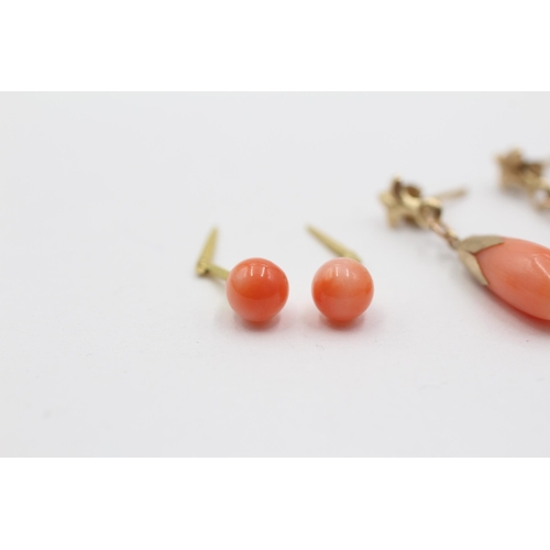 2001 - Two pairs of 9ct gold coral earrings - approx. gross weight 2g