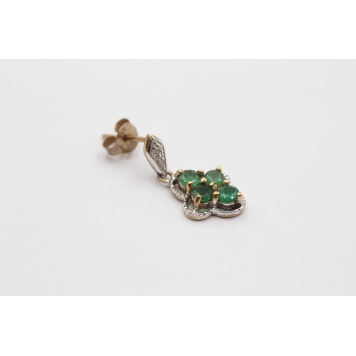 2009 - A pair of 9ct gold diamond and emerald ornate drop earrings - approx. gross weight 1.8g