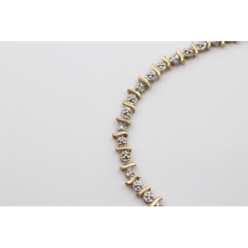 2015 - A 9ct gold diamond twist bracelet - approx. gross weight 4g