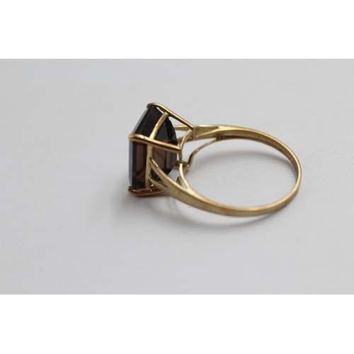 2016 - A 9ct gold smoky quartz cocktail ring - approx. gross weight 2.6g