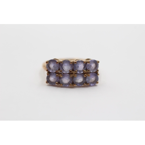 2022 - A 9ct gold tanzanite double row ring - approx. gross weight 2.3g