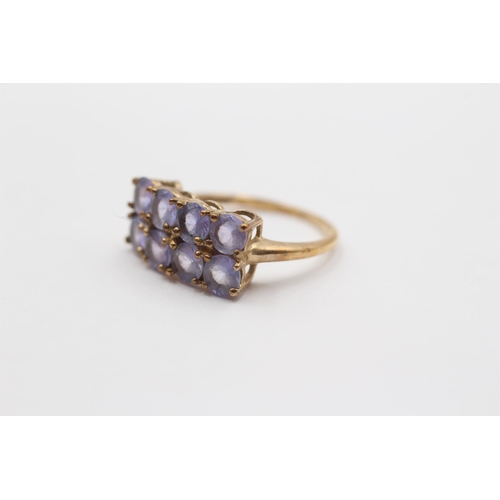 2022 - A 9ct gold tanzanite double row ring - approx. gross weight 2.3g