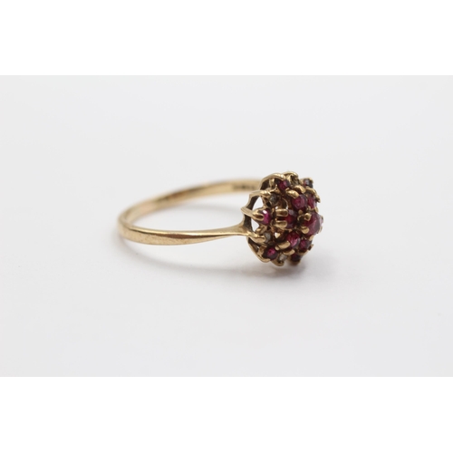 2023 - A 9ct gold diamond and ruby cluster ring - approx. gross weight 2.4g