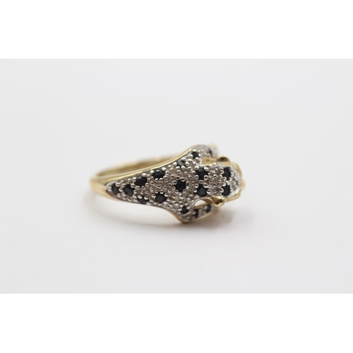 2035 - A 9ct gold diamond and sapphire leopard ring, size M½ - approx. gross weight 3g