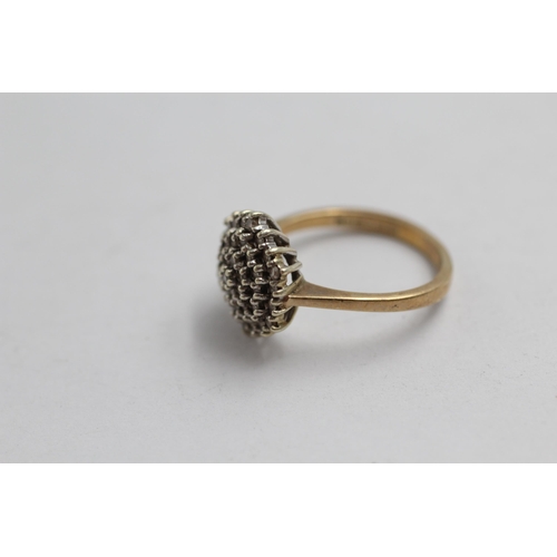 2038 - A 9ct gold diamond cluster ring - approx. gross weight 3g